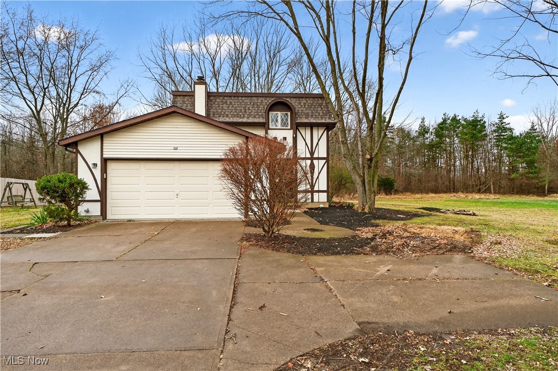 Welcome to this completely remodeled home! The house features 4 bedrooms and 2 1/2 bathrooms. Upon entering you will find the half bath and laundry room to your right. Walking through the entryway you will notice the warm luxury vinyl plank floors that lead you into the bright sunken living room. Off of the living room is the formal dining room that leads into the brand new kitchen. Kitchen updates include white shaker cabinets, quartz countertops, and new stainless steel appliances.  Off of the kitchen is the family room with a stunning fireplace centering the room. The second floor features high ceilings throughout that make the bedrooms feel grand. The primary bathroom and main bathroom have been completely remodeled as well. The basement has also been finished to provide even more living area for your family. Other major updates include a new 200A electric panel and a new roof. This home is truly move-in ready. All it needs is someone to call it home. Schedule your showing today!