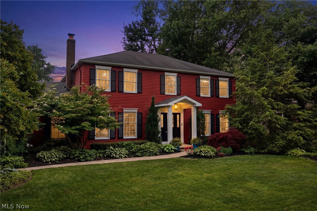 Welcome to this charming 4-bed, 2.5-bath colonial on a picturesque tree-lined street, just a 9-min walk to Bradley Nature Park. Fantastic curb appeal, manicured landscaping, and a rear-entry garage set the tone for a home that blends everyday comfort with exceptional livability. Guests are greeted by a dramatic 2-story foyer with wainscoting, a turned staircase, and new engineered wood flooring that continues through the living rooms and the entire second floor. Hardwood floors enrich the foyer, kitchen and office. The home’s living spaces offer flexibility for both casual daily living and effortless entertaining. The inviting family room features a beamed ceiling, cozy brick fireplace, and a convenient closet, alternately ideal for a future wet bar or custom media center. The open-concept formal living and dining rooms offer a seamless flow for hosting unforgettable gatherings. Living space extends into a fantastic oversized 3-season sunroom (additional 288sf) with three walls of sliding doors offering sweeping views of the private backyard, while skylights bathe the space with sunshine and amber twilight. The renovated half bath is thoughtfully tucked away from living areas for enhanced privacy. Near the garage entry, a pocket office with built-ins offers an ideal homework station, craft room or potential mudroom/laundry conversion. Upstairs, your owner’s suite includes a private bathroom and walk-in closet. Three oversized light-filled guest bedrooms! The finished basement provides even more flexibility for living and recreation. This 0.30-acre lot features a fully fenced private backyard lined by mature trees, a flagstone patio, storage shed, convenient parking pad, and a basketball hoop and playset ensuring endless outdoor fun. EV charging outlet in garage. Ideally 6 min from I-90 and 10 min from Avon Commons and Crocker Park! A rare combination of location, lifestyle and livability, this Bay Village home is ready to welcome its next family.