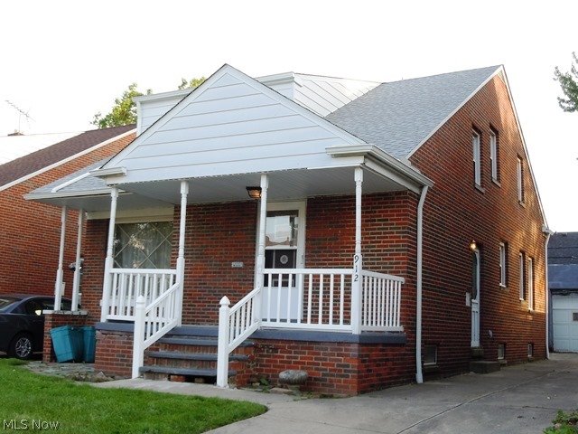 Bring this Six bedroom Two bath Cape Cod home back to life!  This solid Brick home has lots of potential.  Hardwood floors throughout, eat in kitchen and all six bedrooms are generous in size.  Nestled on a quiet street in Collinwood.  A must see, outside of home is deceiving....this is a very large.