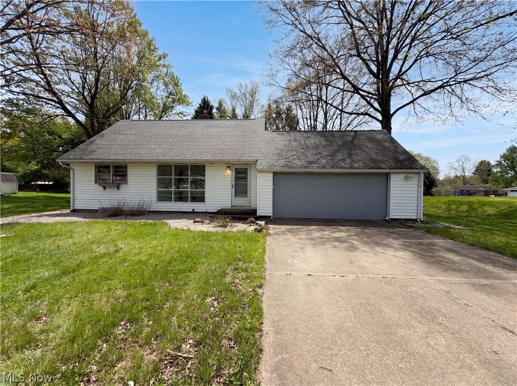 Come see 1064 Munroe Falls Kent Rd, recently enhanced with fresh interior paint and including a cozy fireplace. Outside, a spacious deck provides an ideal area for outdoor activities. This refined residence perfectly combines comfort and modern updates.. Included 100-Day Home Warranty with buyer activation