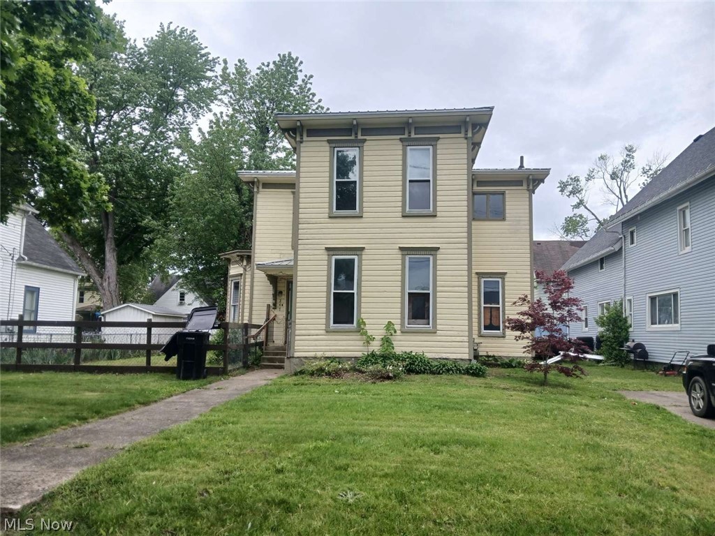 This solid century home with large rooms has been renovated in 2019 with a new metal roof, two remodeled bathrooms, updated plumbing and electrical. All of the rooms are spacious and there is plenty of room to sprawl. It needs some work to refinish it and make it your own. Located on a quiet side street populated by mature shade trees. Selling AS IS.