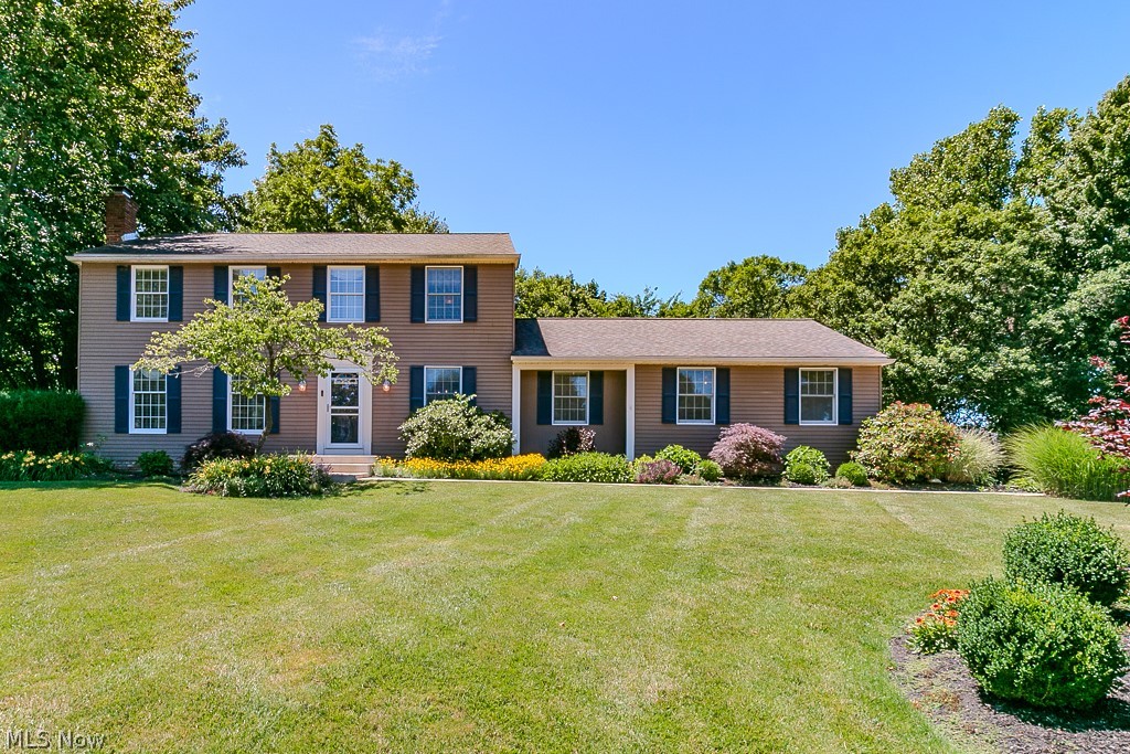 Welcome home to this spacious and beautifully maintained 4-bedroom, 2.5-bath Colonial offering the perfect blend of comfort, functionality, and outdoor enjoyment. The inviting floor plan features generous living and dining rooms, a warm and welcoming family room that opens to the updated eat-in kitchen, creating the ideal space for everyday living and entertaining. Upstairs, you'll find four spacious bedrooms, including a private owner's suite complete with its own full bath and ample closet space. The finished basement expands your living area with a large recreation room, perfect for movie nights, a home office, gym, or game room. Step outside to your own private backyard retreat! Enjoy summer days relaxing on the expansive fenced in deck overlooking the sparkling in-ground pool, all surrounded by mature trees and landscaping that provide exceptional privacy. Whether hosting family gatherings or simply unwinding after a long day, this outdoor space is sure to impress. Additional highlights include a convenient side-entry garage, newer cement drive and sidewalk, newer furnace and air, new garage door, and an updated kitchen with Kraft Maid cupboards . This move-in ready home offers the space, amenities, and lifestyle you've been searching for with plenty of room for both indoor and outdoor entertaining.  Don't miss your opportunity to make it yours!

Information deemed reliable but not guaranteed