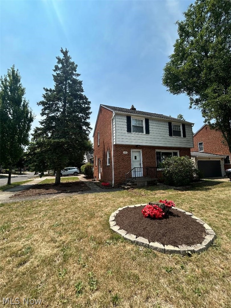 Welcome home to this beautifully maintained brick Colonial offering over 1,500 square feet of comfortable living space. This move-in-ready home features 3 bedrooms, 1 full bath, 2 half baths, and a rare attached oversized 2-car garage.
The inviting living and dining rooms showcase gleaming hardwood floors and abundant natural light from the large picture window. The updated kitchen features rich cherry wood cabinetry, Corian countertops, and flows seamlessly into the impressive family room addition. With its soaring cathedral ceiling, exposed wood beams, convenient half bath, and direct access to the garage and backyard patio, this spacious gathering area is ideal for everyday living and entertaining.
Upstairs, you'll find three generously sized bedrooms, all with hardwood flooring , along with a beautifully updated full bathroom.
The finished lower level provides additional living space perfect for a recreation room, home office, or workout area, complete with another half bath, laundry area, glass block windows, and ample storage, including a crawl space.
Step outside to enjoy the private, fully fenced backyard and concrete patio—perfect for outdoor dining, gardening, pets, or relaxing with family and friends.
Conveniently located just minutes from major highways, hospitals, shopping centers, restaurants, and everyday amenities, this home offers exceptional accessibility while being nestled in a neighborhood with mature trees and shaded sidewalks, ideal for evening strolls or walking your dog.

With its spacious layout, quality updates, outstanding location, and attached 2-car garage—a rare feature in the area—this home is ready for its next owner. Schedule your private showing today!