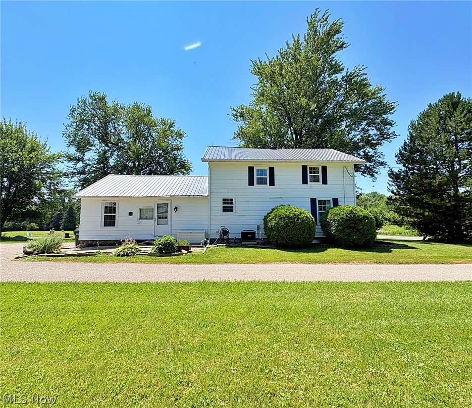 Come and see this beautifully updated farmhouse nestled on over two acres in the desirable Firelands School District, offering the perfect blend of country living and modern comfort. This three-bedroom, one-and-a-half-bath home features a refreshed interior with spacious living areas, a large pantry just off the kitchen, and two additional rooms ideal for storage, a hobby space, or a home office. Outside, you'll appreciate the abundance of driveway parking and a large outbuilding divided into three well-lit sections, providing endless possibilities for storage, a workshop, or equipment. The home's major mechanical systems are powered by the NATURAL GAS WELL.  Surrounded by peaceful countryside, the property offers plenty of room to enjoy the outdoors while maintaining the privacy and charm of rural living. If you're looking for a move-in-ready home with space to spread out both inside and out, this farmhouse is one you won't want to miss.