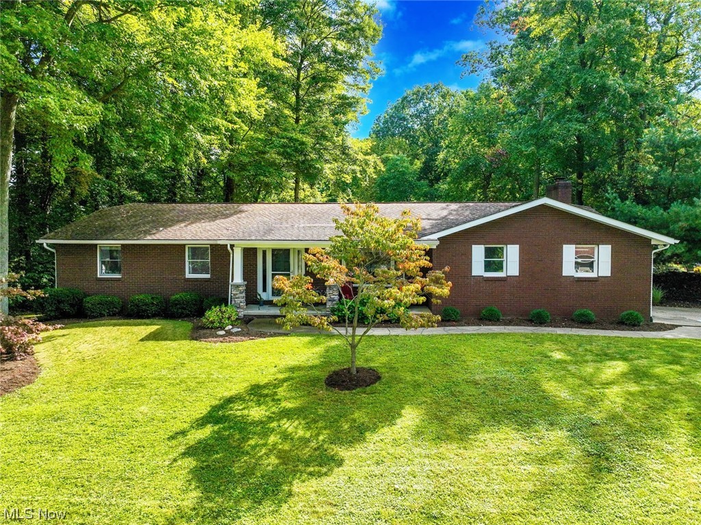 *LUXURIOUS BRICK Ranch W/2,642 Total Sq. Ft. Includes 3-5 Bedrooms, 2.5 Bathrooms, FINISHED Basement, SUNROOM & Attached 2 Car Garage On .50 Acres! *WATERFRONT ~ Sit Outside Around A Fire By The Pond & Enjoy The Relaxing Beauty Of Mother Nature! Catch Small Fish Or Kayak *Serene Setting, Tucked Away In A Neighborhood W/Mature Trees *Winding Concrete Walkway, Front Covered Porch *COMPLETELY REMODELED Upscale Interior!! *Wood Plank Flooring Throughout *Living Rm W/VAULTED 10' Ceiling & Large Picture Window *OPEN CONCEPT Dining, Kitchen & Family Rm! *Eat In Area W/Vaulted Ceiling, SKYLIGHTS, CUSTOM Designer Accent Wall & Sphere Wood Chandelier *Exquisite Kitchen Remodel Includes White KRAFTMAID Soft Close Shaker Style Cabinets, White SUBWAY TILE Backsplash, Leathered GRANITE Countertops & Breakfast Bar, Fully Applianced W/ Frigidaire Gallery SS Fridge, GAS Stove, Microwave, Dishwasher, Recessed + 4 Jar Caged Black Accent Lighting & Custom Stained Wood Shelving *The Family Rm Features A White Washed Brick FIREPLACE & Hearth Adorned By Shelving/Storage *Unwind In The SUNROOM Or Make It Your Office W/Water Views *Three 1st Floor Bdrms Include The Master W/Ensuite Master Bathrm Showcasing A Tiled Walk In Shower + Vanity W/GRANITE Countertop! *2nd Full Bathrm W/GRANITE Countertop *Finished Basement RECREATION RM W/4 BARN DOORS, 1/2 Bathrm LUXURY Floor, Marble Top Vanity + 2 Bonus Rms W/Closets Cld Be 4th/5th Bdrm *AC, FURNACE, H20 TANK 2020, REVERSE OSMOSIS <2 Yrs. *LIVE VIDEO