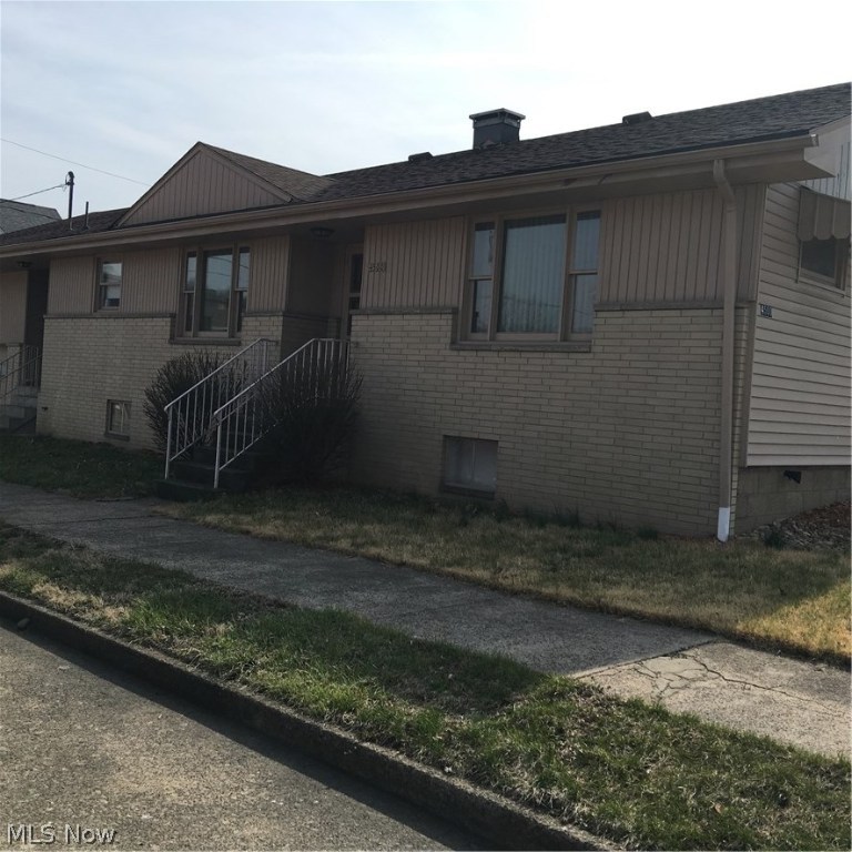 This charming corner lot brick ranch offers 3 spacious bedrooms, one full bath and a half bath in the basement. This very well kept house features two workshop areas to fulfill any of your project needs! One located above the attached one car garage that features easy access to the house and also one located conveniently in the full basement. Enjoy a totally fenced in back and side yard perfect for pets and outside playing! Not to mention it is completely move in ready!