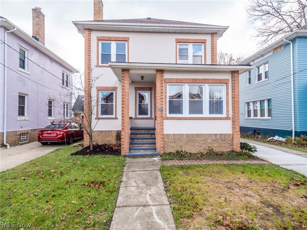 Charming, fully renovated, colonial home in Lakeshore area. Wonderful curb appeal! Brick and stucco exterior. 4 seasons room.  Living room with fireplace. Formal dining room with built-ins. Stainless steel appliances & granite countertops in kitchen. Hard wood on first & second levels. All bedrooms located on second floor & full bath. Large basement includes full renovated bathroom! All new lighting fixtures throughout. Welcome to your new home!