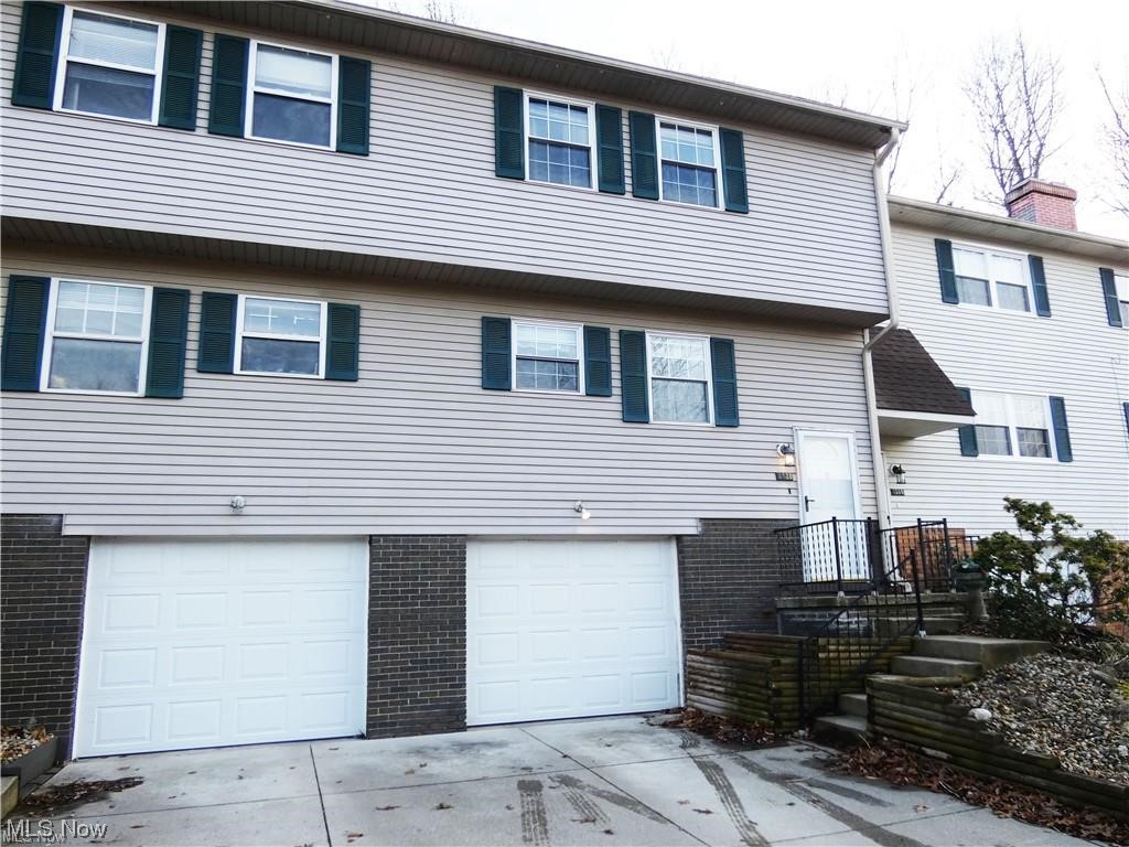 Available February 15, 2024 in Kent, Ohio! Well-maintained, clean and bright 3 Bed/1.5 bath townhouse-style condo in quiet community. Conveniently located near I-76, Route 43, Kent State, and NEOMED. Eat-in kitchen with stainless appliances. HVAC and Dishwasher replaced in 2021. Separate dining and living area. Newer carpeting. Plentiful storage, plus attached deep 1 car garage and an extra parking space in driveway. Additional off-street parking is available. Private fenced patio off the living room. Tenant pays all utilities, except trash. 1-year lease preferred. NO PETS. Washer and Dryer are provided as a courtesy only, and Landlord will not fix or replace, if they stop working. Fireplace is decorative only and cannot be used. Unit is currently rented - pictures were taken prior to tenant taking occupancy. Landlord requires Proof of Funds in form of 3 months of bank statements. Security deposit is one month's rent: $1300