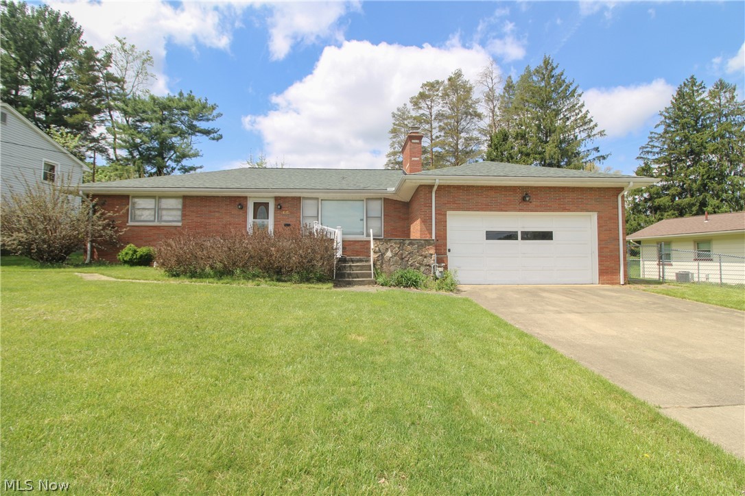 Looking for a ranch in Austintown? Such a surprise as you walk in, it is So much larger than you would ever guess. Spacious living room with fireplace. Lots of natural light floods in from the large windows. Spacious dining. The kitchen was remodeled in the past. Appliances stay. Two spacious bedrooms and a full bath with tub shower combo are off the living room and there is a third bedroom or office space off the kitchen. Large full basement will need some work, with a half bath and laundry. This home has so much to offer. Fenced yard. Attached garage. While the home has hot water boiler heat, they installed Central Air. Call today!