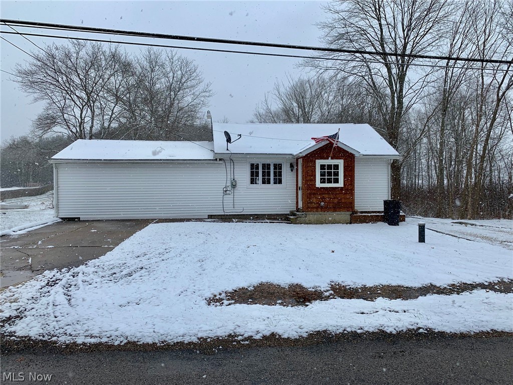 PRICE REDUCED! Settle right into this 3 bedroom remodeled country ranch located in Bristolville. Open kitchen. Nice size living room with open dining area. New windows, electrical, furnace, drywall, interior painting, insulation, laminate flooring and carpet.  1st floor laundry room. Partial basement with glass block windows. Located on a nice 3/4 acre lot. Home Warranty provided to add extra peace of mind! Call Today for your personal showing before it is gone!