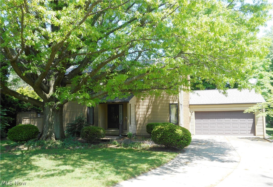 Situated on a cul-de-sac this two story offers 4 bedrooms and 2.5 baths.  There is plenty of room for entertaining with both a family room and a spacious living room, plus a dining room with doors that lead to the private backyard and deck.  The applianced kitchen has a vaulted eating area with sliders that also open to the deck.  There is even a mud room off the 2 car garage and a first floor office with built-in desk and laundry hookup for a possible 1st floor laundry.  The expansive master bedroom has a large walk-in closet and full bath.  Hardwood floors accent the other 3 bedrooms.  An attached shed makes for easy access to your stored items.  For peace of mind the owners are offering a home warranty.  New roof in 2014.  This home has great possibilities!