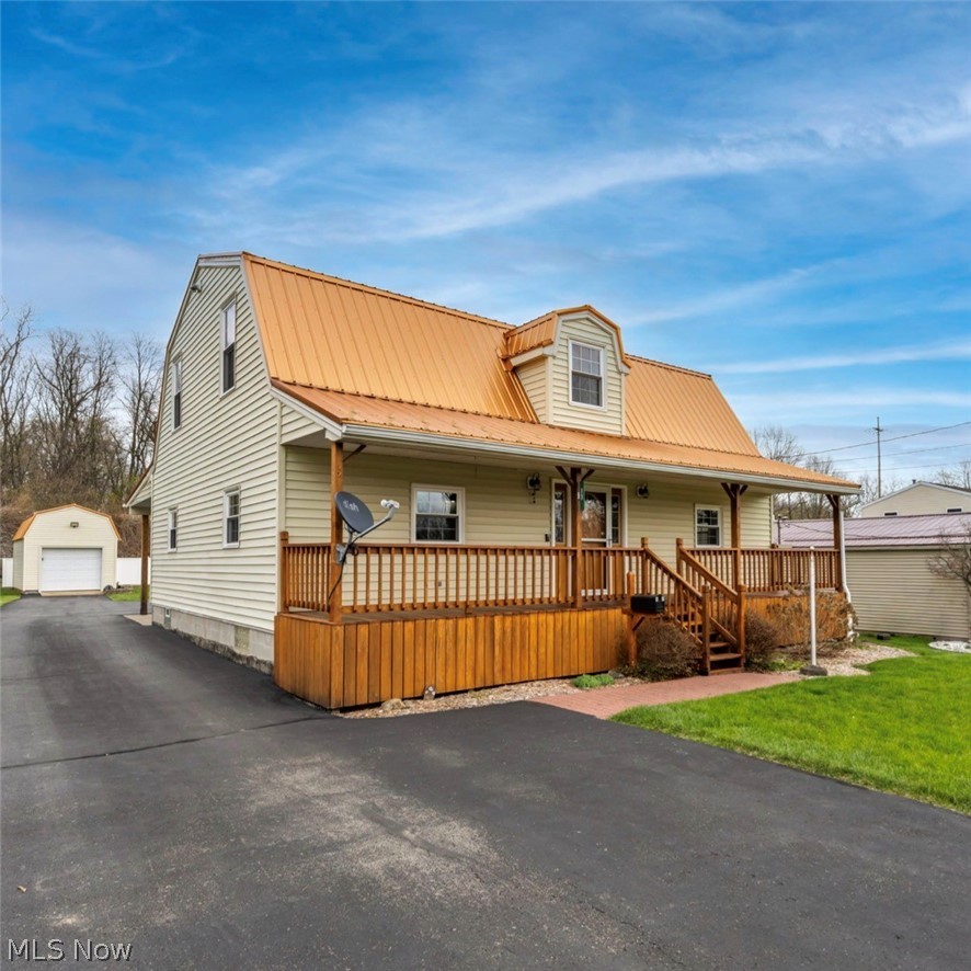 Welcome home to this beautifully maintained cedar and vinyl property built in 2000, offering over 2,300 square feet of comfortable living space in the heart of Newton Falls! This spacious home features 3 bedrooms plus a versatile bonus room—perfect for a home office, playroom, or guest space—along with 3 full bathrooms to accommodate family and guests with ease.
The first-floor master suite provides convenience and privacy, complete with a full bath and a generously sized closet. The thoughtfully designed kitchen showcases quality solid birch cabinetry and a center island, offering both functionality and plenty of space for cooking and gatherings. Downstairs, you’ll find a fully finished basement with a second kitchen—ideal for entertaining, extended living space, or potential in-law accommodations. The home also includes a waterproofed basement for peace of mind, along with a pellet stove for added warmth and efficiency. Enjoy the benefits of major updates and upgrades, including a 50-year warranty metal roof, newer windows with a 25-year unlimited warranty, and a whole-house backup generator system to keep everything running smoothly year-round. Outdoor living is just as impressive with both front and back outdoor spaces. Relax on the front porch and take in views of local fireworks, or unwind on the back patio featuring a covered awning and ceiling fans—perfect for summer evenings and entertaining. This home offers space, functionality, and thoughtful upgrades all in one—don’t miss your opportunity to make it yours!