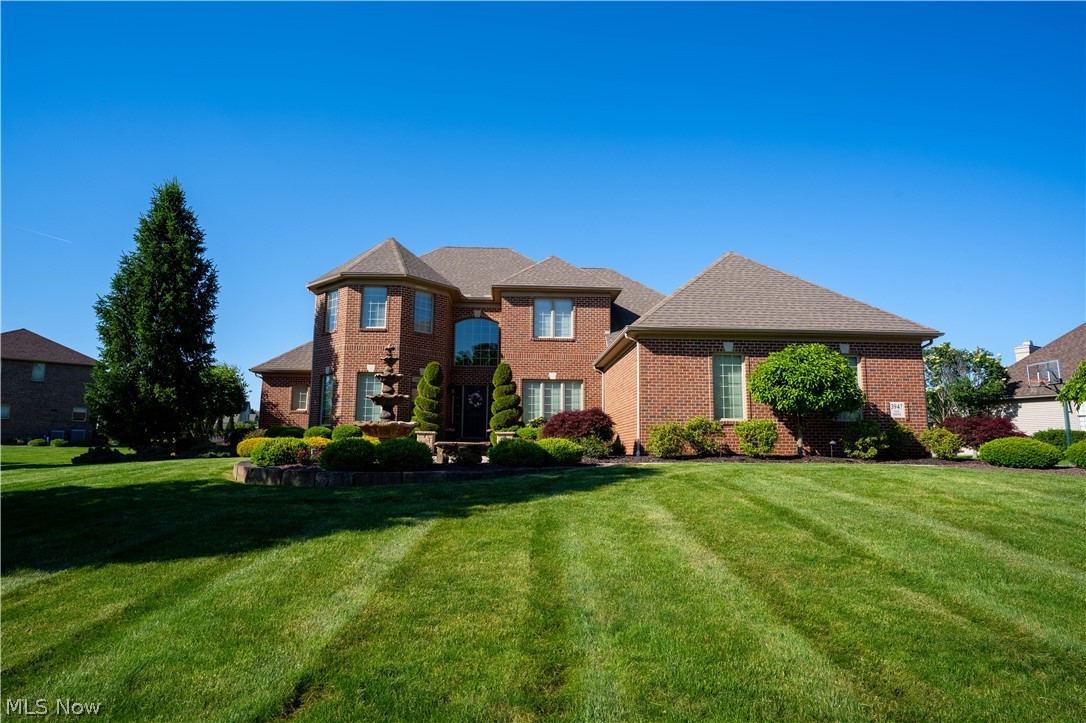 This 4 bedroom luxury home in Tuscany Estates could be yours!  Stunning open first floor plan featuring high ceilings and a fireplace in the living room/great room.  The large kitchen features granite countertops with seating and a breakfast nook overlooking the private backyard.  Spacious first floor master bedroom features a large walk-in closet.  Master bedroom access to the back patio to enjoy the view!  The second floor doesn't disappoint with welcoming tones including three bedrooms and a full bathroom.  Basement is finished for entertaining and contains tons of storage!  Garage also has ample amount of space for 3.5 spaces.  Furnace and waterless hot water tank are only 3yrs old.  Roof is 7.5yrs old.  Come and get your dream home before it is gone!