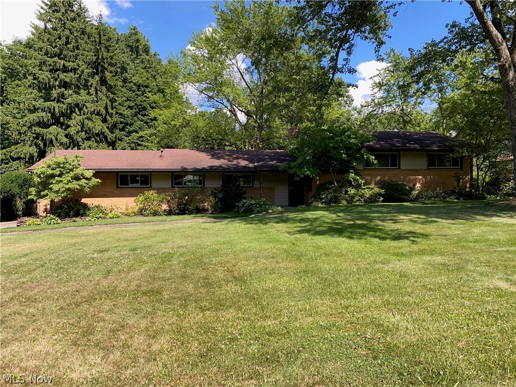 Perfect family home in beautiful Liberty Township.  The main floor of the home offers an updated kitchen, very large living room with floor to ceiling windows, that look out to an almost acre private backyard.  The home features a great dining room for entertaining, and a first floor office or additional bedroom with a newly renovated full bathroom. The second floor boasts a master bedroom, with lots of closet space, and two other large bedrooms.  The master bathroom and additional second floor bathroom have both been recently updated.  The lower level of the home has an additional bonus room that can be used as a theater room, man cave, she-shed or play room.  This level of the home has an additional bedroom and a laundry room.  The unfinished basement area offers plenty of storage space.  You will enjoy the warmer months on the outdoor deck, that looks out on the beautiful and private backyard.  This is a very unique and must see home.  Book an appointment today!