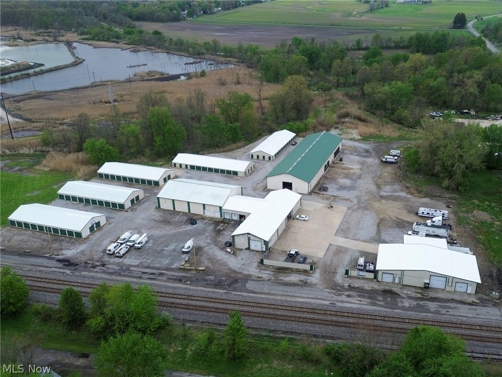 Auction on-site and online Wednesday, June 17th. Bidding Starts at 5:00PM EST. Open house Monday, June 8th from 4:00PM to 7:00PM EST. This well-maintained self-storage investment opportunity in Rittman offers a diverse asset with multiple income streams. The property features 130 traditional storage units, including 4 (5x10), 8 (10x10), 88 (10x20), and 4 (10x40) units, along with 26 brand new climate-controlled units consisting of 3 (10x20), 7 (10x15), and 16 (10x10). The strong unit mix supports consistent demand and occupancy. In addition to standard residential storage, the property includes 8 commercial tenants totaling approximately 24,200 square feet, providing significant supplemental income. There are also ~40 outdoor parking spaces, adding further revenue potential for vehicle or equipment storage. The property is well maintained and supported by security features including surveillance cameras and on-site lighting. With strong in-place income and upside through rent increases and lease optimization, this asset offers stable cash flow and growth potential. Located in a market with a current moratorium restricting new self-storage development, the property benefits from reduced future competition, helping support long-term occupancy and rental stability.