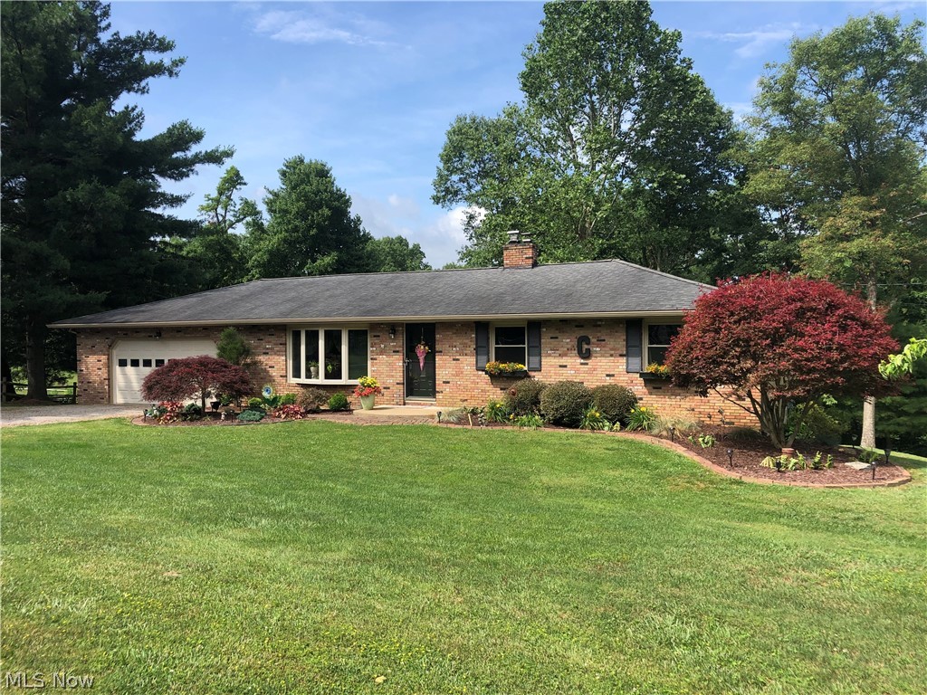 Very well maintained move in ready ranch. Many updates including a beautiful kitchen with granite countertops, custom built cabinets, island and tile flooring. Huge 14X44 deck overlooks a well landscaped large backyard with newly painted storage building and amazing garden area. The partially finished basement with walk out was remodeled in 2019 with all new paneling, carpet and ceilings. Wood burning fireplace in basement.  Call to schedule a showing of this meticulously cared for home.