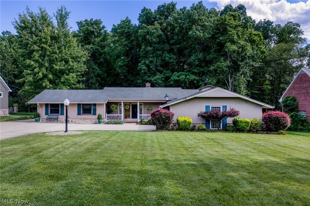 Welcome to 3270 Harris Road. This meticulously kept ranch set on 1.75 acres, offers an open floor plan that highlights the pride of ownership from its only two previous owners. The beautifully updated gourmet kitchen features sprawling granite countertops perfect for culinary creations and entertaining. The stunning stone front fireplace serves as a focal point in the living area, while large windows offer interior views of the peaceful backyard, creating a serene environment. This home is full of natural light creating an inviting and airy atmosphere throughout. The expansive covered patio invites outdoor living and relaxation, complemented by a welcoming front porch ideal for enjoying the tranquil country setting. Additionally, the ranch is situated within the sought-after Brecksville/Broadview Heights school district, conveniently located near highways, metroparks, and the airport. Making this home ideal for commuters and families looking for both comfort and accessibility. Significant updates throughout the home include HVAC system, windows, driveway, electrical panel, and main bathroom. The laundry area is located on the main floor. Schedule your showing today!