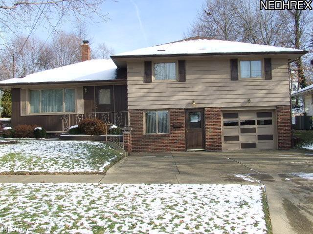 Lovingly kept 4-level split level with large living room, dining room with French doors to patio, fully applianced kitchen includes double oven, family room with office space and 2nd full bathroom, 3 bedrooms, attached garage, wide drive with extra parking, shed, home warranty.  Double lot gives nice size two-level backyard.  Two bedrooms have double closets.  Newer roof.  See it today!