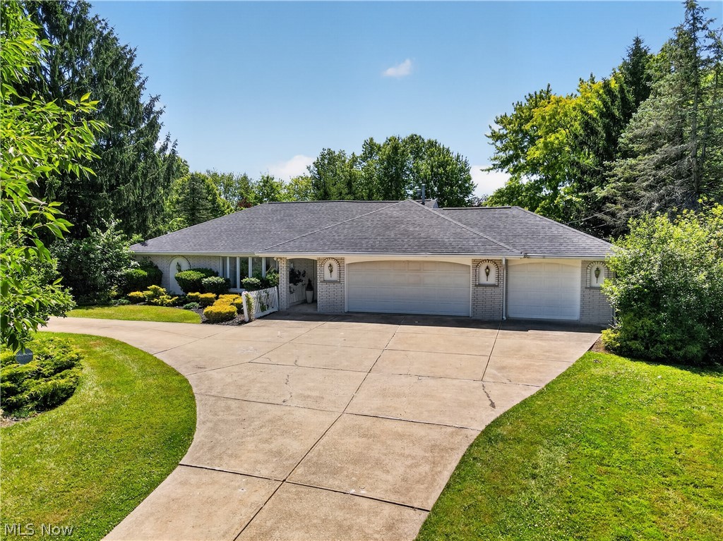 Discover unparalleled tranquility in this rare, sprawling ranch home nestled within the highly coveted Foxwood Farms community. Set on 1.5 acres of breathtaking, park-like grounds, this 2,500+ square foot masterpiece offers the ultimate in peaceful, true first-floor living. Enjoy the luxury of quiet neighborhood streets and multiple serene lakes that make this development so spectacular.
Meticulously maintained with unmistakable pride of ownership, this 3-bedroom, 3-bathroom home is designed to balance grand entertaining with everyday comfort. The expansive floor plan boasts multiple living areas and a bright, cheery sunroom that floods the space with natural light while overlooking the lush grounds. At the heart of the home, the upgraded kitchen features newer appliances—including double ovens—ready for the home chef. When it's time to unwind, retreat to the oversized primary suite, thoughtfully set apart from the guest bedrooms to provide a quiet, private sanctuary.
Step outside into your own personal retreat. The secluded backyard features dual, beautifully hardscaped private patios, offering the perfect setting for morning coffee, al fresco dining, or evening gatherings. Practical luxury is evident everywhere you look, from the impressive circular driveway and the highly desirable 3-car heated garage to the peace of mind that comes with a newer roof.
This meticulously cared-for property is a truly rare find. Don't miss your chance to own this slice of serenity—schedule your private tour today!