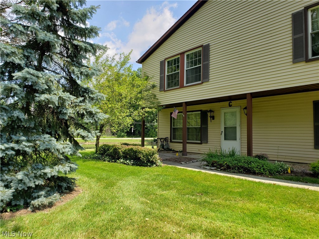 Live like you're on vacation! 3 bdrm, 1.5 bath condo against the woods next to fishing pond. Water & Sewer are included in condo fee! L-shaped living/dining room opens to kitchen with breakfast bar. All appliances stay. New windows 2009 (except 2 small bdrms). New dishwasher 2018. Stackable washer/dryer. New wood plank laminate floors on first floor 2019. Newly renovated half bath 2017 (new toilet, vanity, sink, faucet & lighting). 305 acre lake for swimming, fishing, boating, & waterskiing. 2 soft sand beaches, 2 in-ground pools, 2 playground facilities, 4 tennis courts, basketball courts, baseball diamond, volleyball courts, marina, party center, swim team, & lots of planned neighborhood parties & events throughout the year. Dock space only $200 per year!