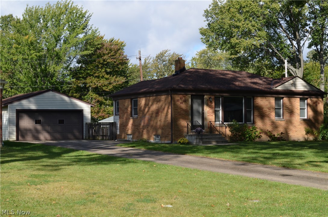 Updated brick ranch in the heart of Avon. Updated throughout including custom kitchen cabinetry, granite countertops, stainless steel high-end appliances, new plumbing fixtures, garbage disposal, ceramic tile floors. Recessed lighting. Newer vinyl windows throughout most with blinds. Custom bathroom with tile walk-in shower, glass wall, upgraded plumbing fixtures, vanity, granite top and tile walls. Hardwood red oak floors under all carpet. New trim, interior and exterior doors. Roof is 4 years old (tear-off) Dry, previously waterproofed basement with newer sump pumps. Open, clean and painted. Solid foundation. Glass block windows with vents. Upgraded plumbing and drains. Upgraded electrical panel, runs and white receptacles/covers. Tastefully decorated with nice paint pallet. All brick home saves on energy costs! Newer furnace and A/C. Oversized garage with newer door and opener. Newer fenced yard for privacy. Perfect for kids and/or pets. Paved drive. Great stretch of the road with m