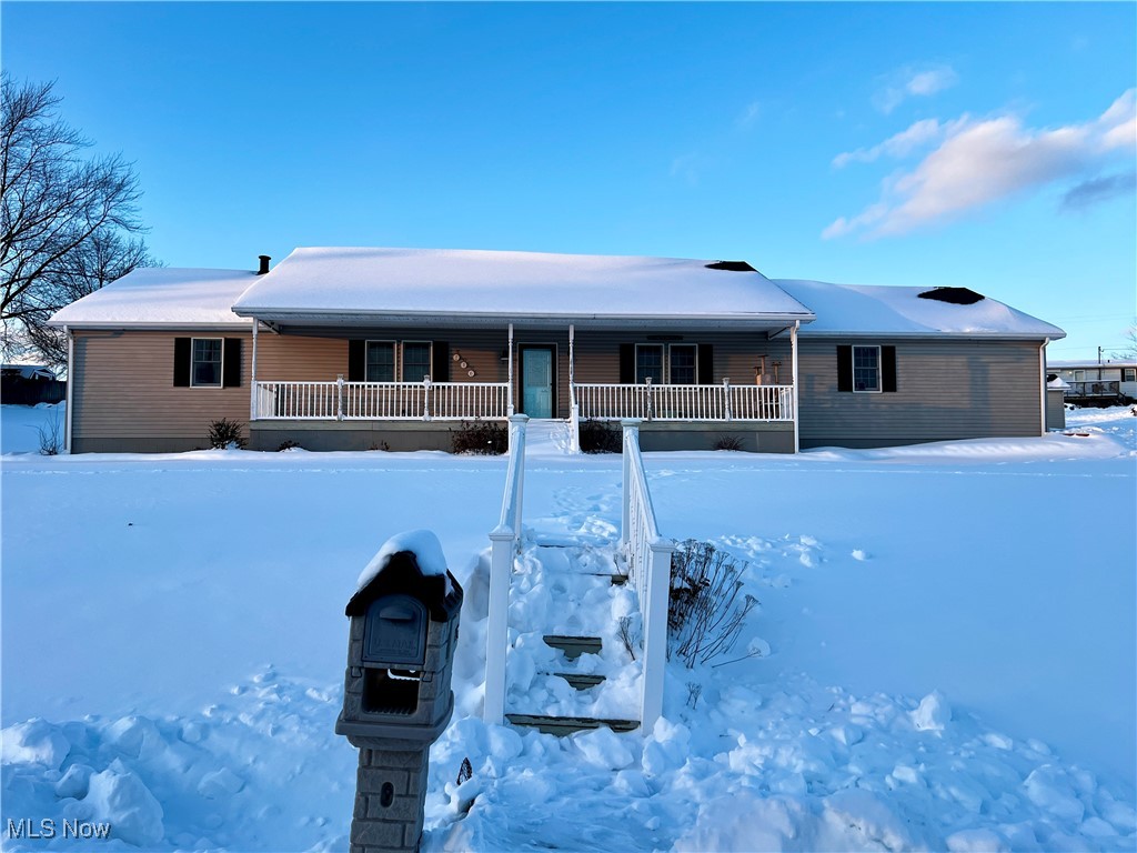 This beautifully updated 3-bed, 2-bath ranch-style home offers comfortable one-level living with plenty of space inside and out. The home features a large, updated kitchen with ample cabinetry and counter space, perfect for everyday living and entertaining. Recent updates throughout give the home a fresh, move-in ready feel. Step outside to enjoy the above-ground pool or entertain in the three-seasons room, ideal for summer gatherings and relaxation. In the colder months, continue to entertain and relax in the finished basement rec room, complete with a bar and plenty of storage. A large detached garage provides excellent storage , workshop space, or room for vehicles and hobbies while the large attached garage provides plenty of parking space. With a functional layout, modern updates, and great outdoor amenities, this home is a must-see. Call your favorite agent today to schedule your showing!