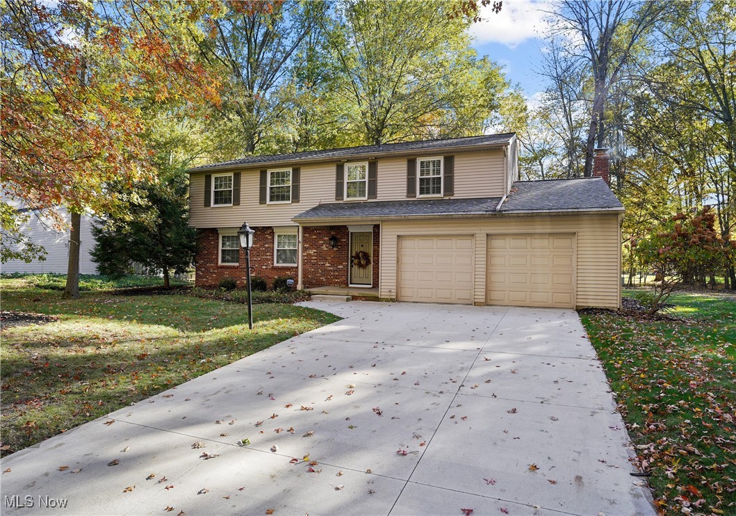 This stunning home has been beautifully decorated and thoughtfully updated throughout. Step into the spacious living room and immediately feel the warmth and style that flow through the home. The kitchen features granite countertops, a striking backsplash, and modern updates that make it both functional and elegant.  The sliders to the backyard provide alot of light.  The entire first floor was completely redesigned and updated in 2019 to include the flooring and baseboards, showcasing quality craftsmanship and tasteful finishes. The family room, currently used as a large dining room is perfect for entertaining and features a beautiful wood-burning fireplace.  A stylishly updated powder room and a convenient first-floor laundry/pantry—rarely found in homes like this—complete the main level.  Upstairs, you’ll find four spacious bedrooms, each offering ample closet space and plenty of natural light. Both full bathrooms were tastefully updated in 2014, including the primary ensuite, which features a gorgeous bath with both a  walk-in shower and walk-in closet, creating a private retreat.  The basement offers excellent potential—easily finished for additional living space, a home gym, or recreation area. A two-car attached garage adds everyday convenience, and the flat backyard with a storage shed is perfect for outdoor enjoyment.  This home has been meticulously maintained, with many key updates including: roof (2020), driveway (2019), hot water tank (2018), and refrigerator (2025). The seller is also including a home warranty for added peace of mind.