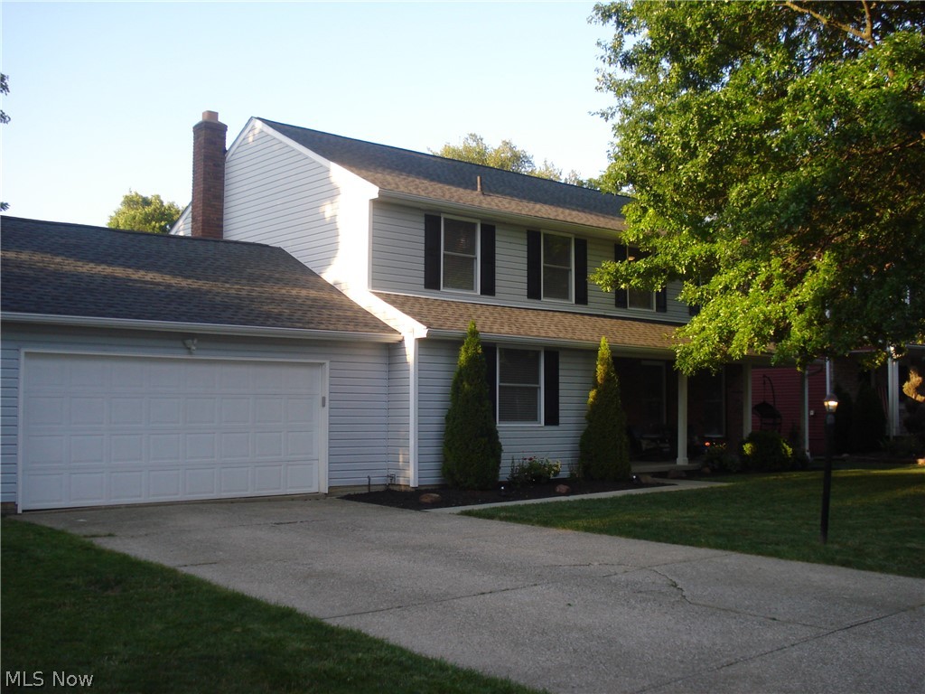 Welcome to this stunning home, this Colonial is spotless from top to bottom and has been tastefully remodeled. We have 4 bedrooms and 3 full and 1 half bath. All of the bathrooms have heated ceramic floors and under cabinet lighting with granite counter tops. A first floor office or additional bedroom. The spacious living room is warm and inviting and flows into the formal dining room with Pergo flooring. The fabulous kitchen has shaker style soft close cabinets, granite counter top, subway glass tile back splash, Pergo floor, and stainless steel appliances refrigerator, range/oven, dishwasher and microwave. The comfortable family room with a fireplace and Pergo flooring flows into the kitchen with access to the deck to enjoy with Lake and woods views. The upstairs master suite has a walk in closet, a private bath with a tiled shower. There are 3 additional spacious bedrooms. The full finished Rec room with a wet bar is any one's dream 42 x 13 with plenty of space for gatherings and en