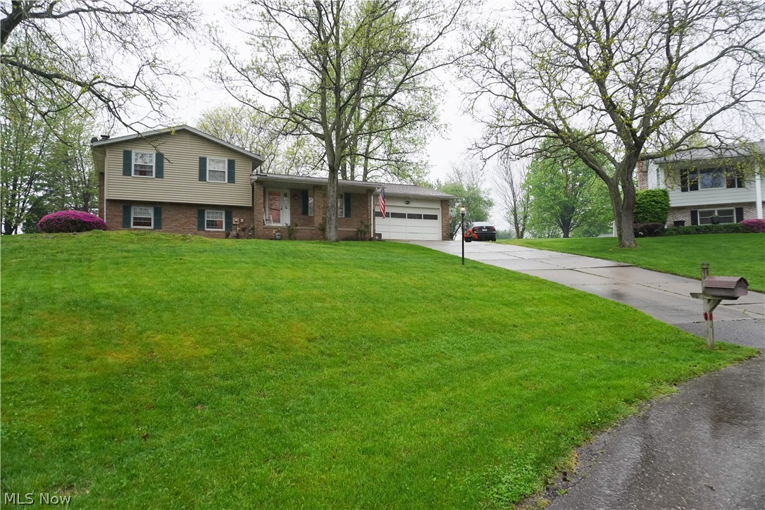 WELCOME to this VERY well kept home in Lake School District.  Outside features a large backyard, New Septic Tanks (2019), New Roof (2016), New Furnace in crawl space, a nice sized deck, a shed and a fire pit.  As you approach the front you will be welcomed by the large front porch to sit out on and enjoy the quiet.  You will enter into a nice sized foyer with the Living room to the right and dining room straight ahead.  Next to the dining room you will see a fully updated kitchen to cook those gourmet meals for your family.  Off the dining room you will enter the carpeted 3 seasons room.  Upstairs you will find the 3 nice sized bedrooms and full bath.  Down a few steps you will find the family room and another full bath as well as the laundry room.  Call today for your private showing you won't want to miss it