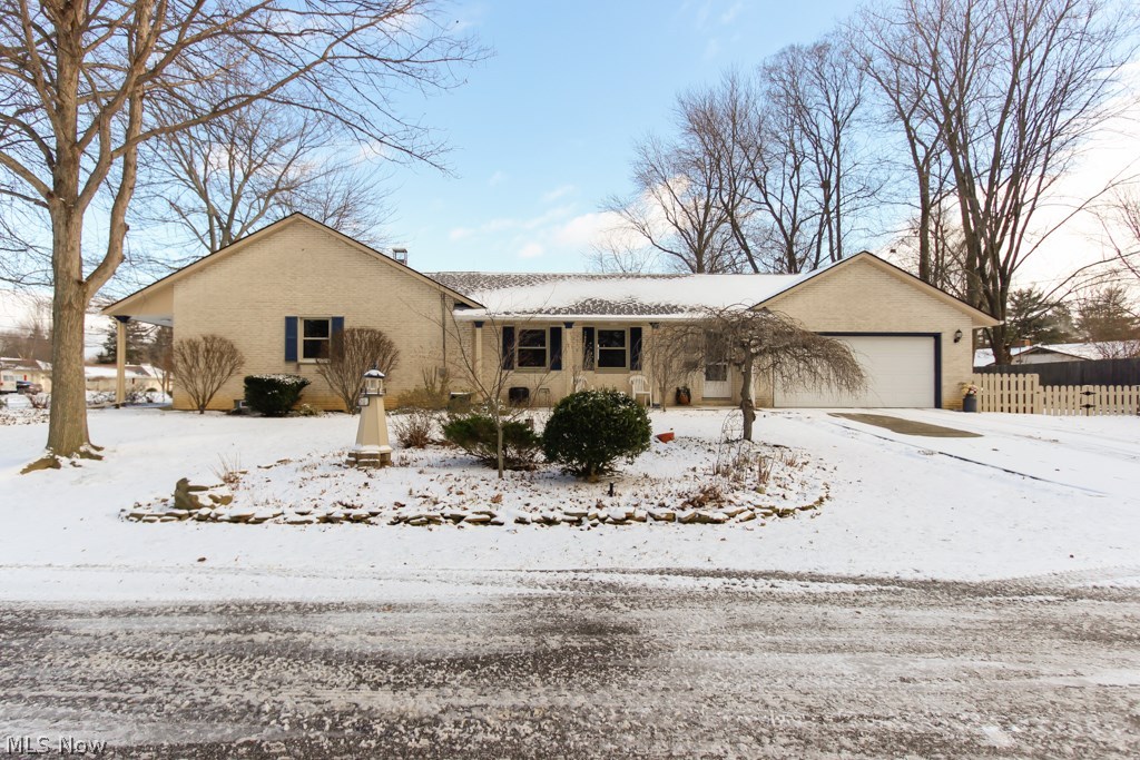 Sprawling Brick Ranch on a private, corner lot in beautiful Olmsted Falls. Room for the whole family and more. New windows with a lifetime transferable warranty installed in 2013. New hot water tank and glass block windows. Entire A/C unit is new including new duct work. Master bedroom has attached full bath. Basement Living Room complete with wet bar makes this the perfect home for entertaining. Private lot includes a beautiful perennial garden, sprinkler system and fenced-in yard. This home is truly loved and waiting for You to move right in. See it today before it is too late!
