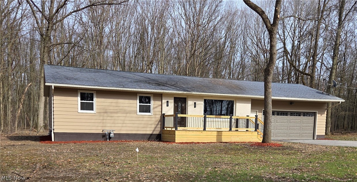 Perfect Time to check out this uniquely updated Three Bedroom, Two Bathroom, with a fully renovated Basement across the street from Lake Milton. This location offers easy access to all that Lake Milton has to offer. Including Golf Courses, Restaurants, Winery, Shopping, Highways and most of all Lake Milton. This home rests on 2.41 Acres and offers two brand new Decks located on the front and back of the home. All of the exterior and interior doors have been replaced with new. In addition, all of the windows have been replaced with windows that have a lifetime warranty. Also, all the Basement windows have been replaced with new glass block windows. A Gas line was run to the home providing us the opportunity to add brand new Forced Air Gas Furnace, new Ductwork, and new Condensing unit adding Central Air and more economical heating source. The two baths have been completely updated, all the flooring throughout the home has been replaced, Cabinets, Countertops, Appliances, Lighting, and much more make this a truly Move in Ready Home!