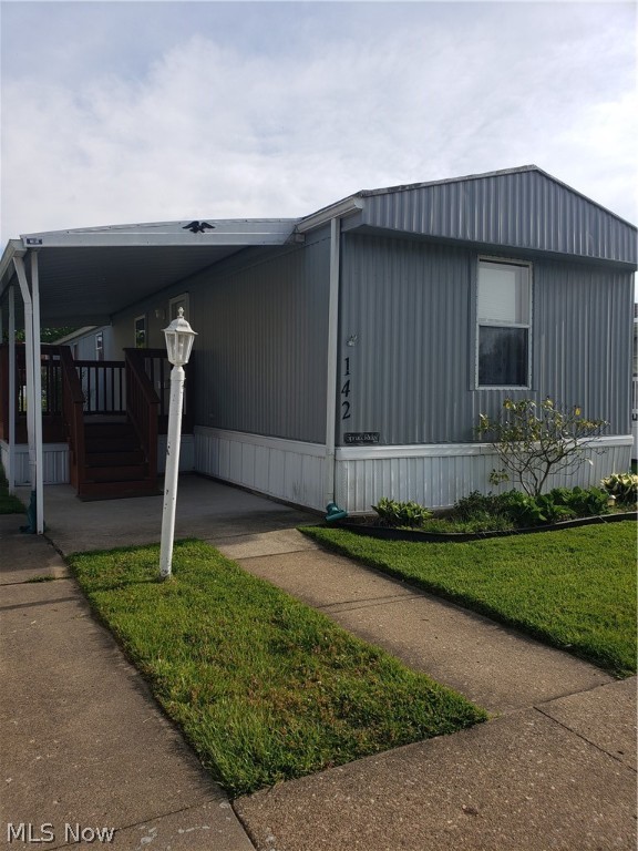Adorable neat and clean 2 bedroom, 2 bath mobile home with shed, patio, and covered deck. Many improvements in the last couple years. New carpet in master bedroom, master bath was renovated approximately 2 years ago with new shower, flooring and hot water tank. Second bedroom also has newer flooring. Appliances stay - no warranties. New window in living room and storm door in 2020.