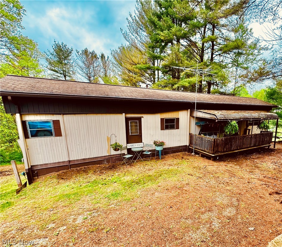 Spend your days enjoying everything Lake Life has to offer and then retreat to your cozy vintage mobile home situated on over half an acre of private property The spacious two-tiered backyard provides ample room for outdoor entertaining, from barbeques to games and family gatherings. The homes full basement makes for a perfect workshop and provides plenty of storage space. Boat Dock is available through the Edgewater Park Docking Association. Whether you're looking for a quiet retreat or a fun-filled escape, this property offers the perfect blend of nature, privacy and recreation.
