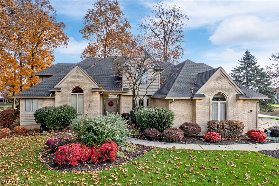 This custom-built solid brick home is located on stunning Swan Lake on Wooster’s north end.  The home is located on a cul de sac, nestled among majestic trees and gardens planted with flowering perennials. From the front door you enter a 2-story grand foyer with a beautiful staircase and hardwood floors.  The great room features a gas fireplace and massive windows overlooking the calming lake and landscaped lawn. The spacious deck is ideal for dining and entertaining.  The private dock sits on a stocked pond, offering easy access to fishing, kayaking, and paddle boating. Ducks and herons frequent the pond, in addition to the resident swans. The owner’s suite, on the main level, features a full on-suite bath and French doors leading to a private covered patio. The open kitchen includes a cozy hearth room. The kitchen offers Corian countertops, solid cabinets, pantry and stainless appliances.  Two half baths and the laundry room are also located on the main level.  Up the main staircase