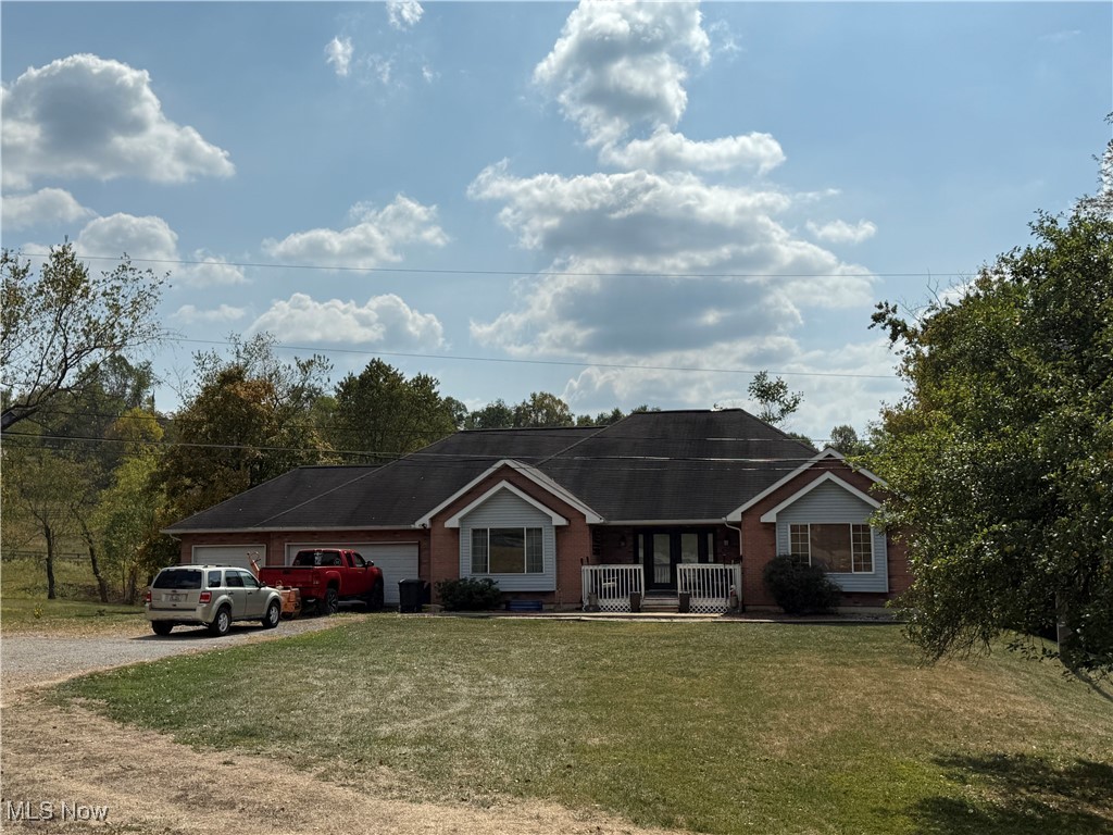 Built in 1998 this 4 bedroom 2 bath RANCH offers an open floor plan with room to grow.  Upon entering you are met with vaulted ceiling and spacious open airy flow.  To the left there is an additional bonus room which could be a great space for an office.  Kitchen is large with plenty of cabinets and counter space which is open to the dining area to keep the conversation flowing with the cook in the house.  This wing of the house is were you will find your primary bedroom and ensuite. Sliding glass door leads to the back deck for taking in nature at your leasure. Living room features vaulted ceilings and electric fireplace, and Sliding glass door leads to back deck as well. The opposite wing is where you will find 3 more bedrooms and main bathroom featuring spacious shower. Downstairs can be finished for a large family room.  Current basement level houses a huge exercise/weight room, a large gameroom, and is plumbed to add additional 3rd bathroom. This home also has a woodburner to provide additional heat in the winter.   So much potential with the massive sq footage available to make your very own!