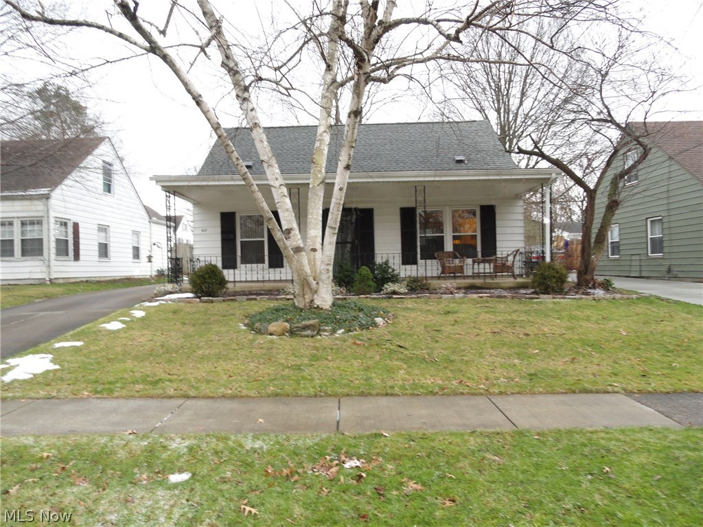 Charming Cape with attractive curb-appeal and an inviting front porch.  Lovingly maintained , clean and cozy with  tasteful décor throughout.  Small addition creating a mud room, breakfast nook and an expanded kitchen with  nice open dining area. Fully applianced kitchen includes a newer stove and the laundry room has a very nice newer stackable washer and dryer.  New roof, gutters and downspouts in 2012.  Nicely updated bathroom too.  Concrete driveway leads to 2 car garage.  Sunny backyard.  Desirable Cuyahoga Falls neighborhood surrounded by nicely maintained homes.