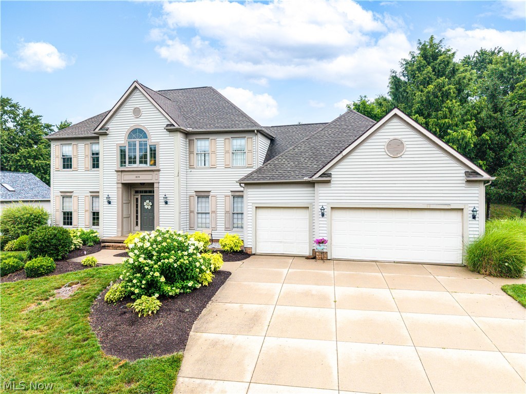 Welcome to 809 Adam Run Drive, where timeless design meets modern comfort in the highly desirable Woodhaven community of Cuyahoga Falls. Situated on nearly a half-acre lot, this beautifully maintained 4-bedroom, 2.5-bath colonial offers approximately 3,000 square feet of thoughtfully designed living space with room for everyone.

Step inside to discover a bright and inviting floor plan featuring a spacious eat-in kitchen with abundant cabinetry, hardwood flooring, and stainless steel appliances that seamlessly flows into the comfortable family room?perfect for everyday living and entertaining. A dedicated first-floor office provides the ideal work-from-home space, while the finished lower level offers additional living space for a recreation room, home gym, or media area.

Upstairs, the generous primary suite serves as a private retreat with a beautifully updated en-suite bath featuring a custom tile shower, dual shower heads, and modern finishes. Three additional bedrooms provide flexibility for family, guests, or hobbies.

Enjoy the outdoors from the expansive deck overlooking the large backyard, offering plenty of space to relax, entertain, or play. Additional highlights include a 3-car attached garage, numerous interior updates, and a location just minutes from parks, shopping, dining, and major highways.

Don?t miss the opportunity to make this exceptional home your own?schedule your private showing today!