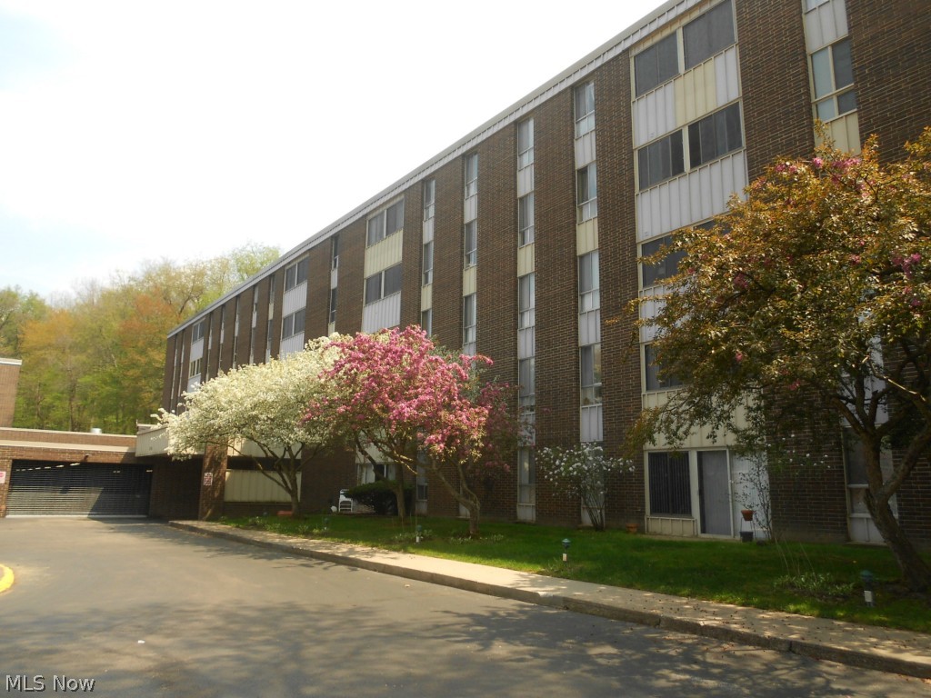 Rarely available ground floor condo in "C" building!  Super sharp, won't last!  Ceramic tile entry and bright eat-in applianced kitchen with newer laminate flooring.  Kitchen, living and dining area has been freshly painted.  Updated full bath vanity, mirror and fixtures.  Enjoy the 3 season sun room with newer ceramic tile flooring and sliders that provide easy access to walk outside.  Condo includes garage space 152 and storage unit #37.  Community amenities include party room, guest suites, outdoor heated pool, exercise room, bocce ball court, clubhouse and more.  Condo maintenance fee covers all utilities (even cable), except for phone.