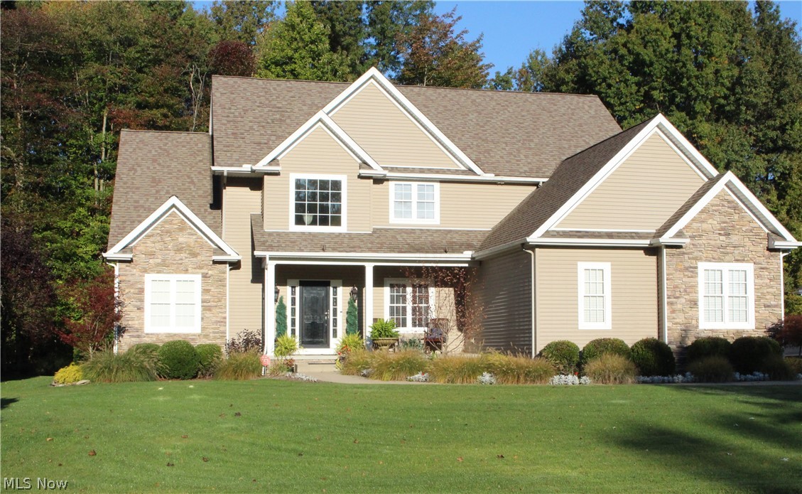 This immaculate 4 bedroom and 4 and a half bath 2-story showcase home is located in Cortland.  It has been meticulously maintained and is in excellent condition.  Home features: spacious open floor plan with gorgeous hardwood floors, featuring a great room with a 2-story vaulted ceiling and a gas stone fireplace, 3-car attached garage, beautiful large open kitchen with a huge island for entertaining, first-floor master bedroom with walk-in closet, Duncan designed master bath with a double sink, granite countertops, ceramic tile heated floors, jacuzzi tub, and a separate glass shower which includes a heated floor, 3 upstairs bedrooms all with walk-in closet’s and bathroom access, first-floor laundry, finished basement with a built-in entertainment center, bar, wet bar, second living room, full bath, exercise area, and tons of storage. The entire interior of the house has been upgraded to its fullest potential. Outdoor Features: stone and vinyl exterior, double-wide concrete driveway, pr