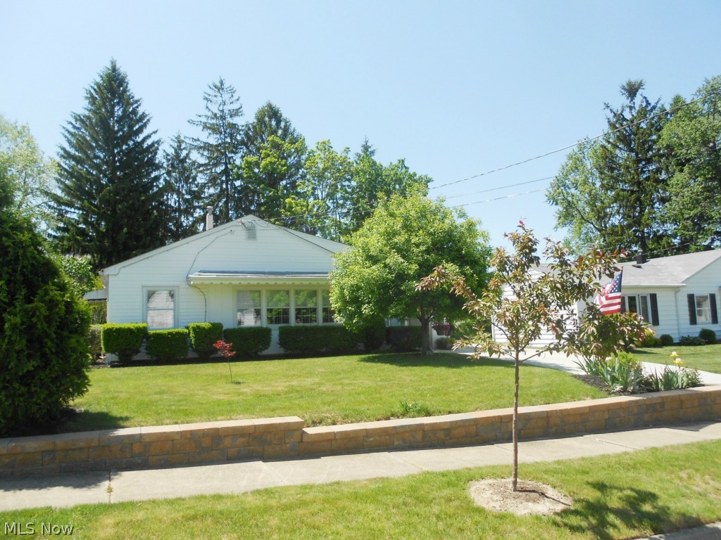 Are you looking for 1 floor living, which could be an alternative to condo living with nothing to do?  This property will fit your needs and is in a wonderful location – close to Portage Crossing.  Only 2nd owner in 65 years = a well loved and maintained property.  This 3 bedroom home features a spacious living room and an eat-in kitchen with lots of natural light.  Off the kitchen a convenient laundry room offers ample storage.  Enjoy the outdoors from the comfort of the 3 season sun room.  A bonus room off the master could be used as an office, walk-in closet, or an exercise room and has a door (installed 2012) which leads to the fabulous backyard.  Updates include a brand new concrete driveway (2012 – previously it was gravel), front yard landscaping wall (2013) and newer roof (8-9 years young).  2014 updates include garage roof, carpeting in back bedroom, hall & living rm, A/C installed and hot water tank.  1 ½ car garage plus a room for workshop, hobby room or storage complete thi