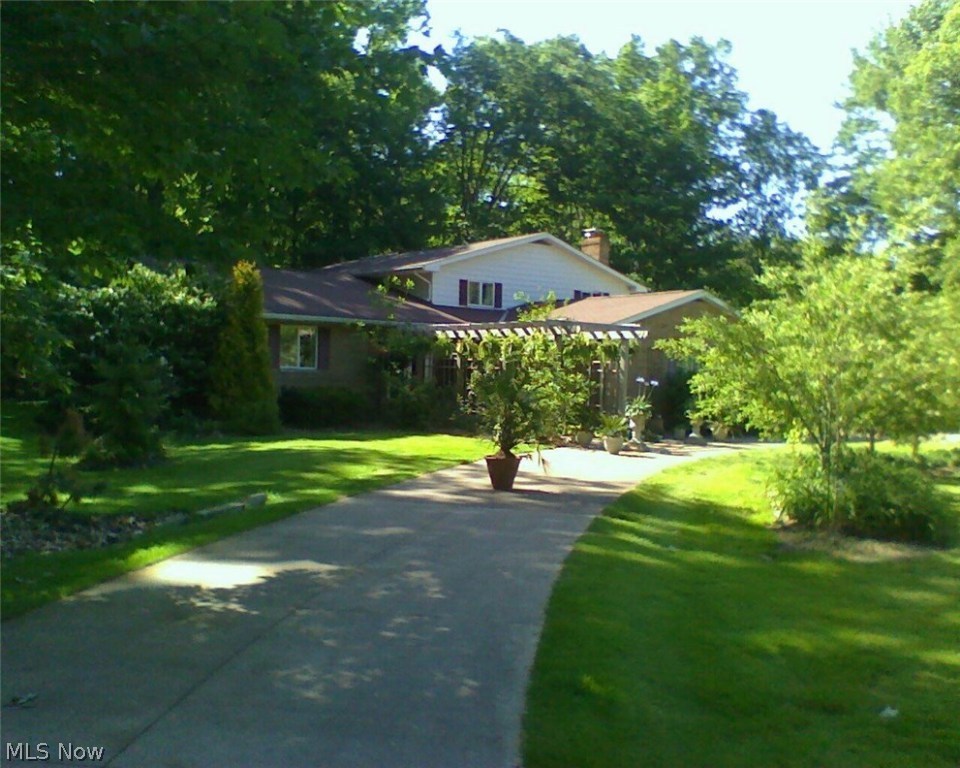 Big Family? * Like to Entertain? * Indoor Pool Parties? * Huge 3,416 SF, ‘FOUR’ Level Split/Colonial * Owners Are Interior/Floral Designers So This Is Not Your TYPICAL Home * Every Room Has Its Own UNIQUNESS * Beautifully Decorated With Elegance & Charm * Many Updates Within The Last 15 Years: New Kitchen, Bathrooms; Most Flooring; Landscaping; Most Fixtures; HWT; Garage Door; Interior Painting Within Last 3 Years * 5 Bedroom’s, 3 Full Baths, Vaulted Ceilings In Foyer, Living Rm & Dining Room * Kitchen Has Granite, Appliances, Including Freezer, Center Island, Pantry W/French Doors & Greenhouse Window W/Seating In The Dining Area * Master Bedroom Has 2 Walk-In Closets & Master Bath * All 4 Upstairs Bedrooms Have Double, Lighted Closets & Ceiling Fans * Marble Floors In Formal Dining Rm, Living Room Plus In The Foyer Which Has A Curved Staircase * 3 Steps Down To Bedroom #5 and a Family Room W/Track Lighting, Stone-Wood Burning Fireplace PLUS Another 20 Ft Family Room W/Ceramic Tile Plus Two 7x6 Rooms-One Is Used As A Bar * Then Walk Out To The Glass Enclosed, In-Ground, Heated, Pool (Gas Heater 10 Yrs Old &amp; Liner Approx. 5 Years)-Sellers Use Pool Year-Round * Finished Basement with yet ANOTHER Family Room Plus Office or Work-Out Room and a Storage Room * 2 Concrete Patios, 26x16 & 20x12 * 2 Car Att Gar W/AGDO * Circular Driveway * If You’re Looking For Privacy, This Home Sits On Almost 2.5 Wooded ACRES Near Golf Course * ONE YEAR HMS HOME WARRANTY