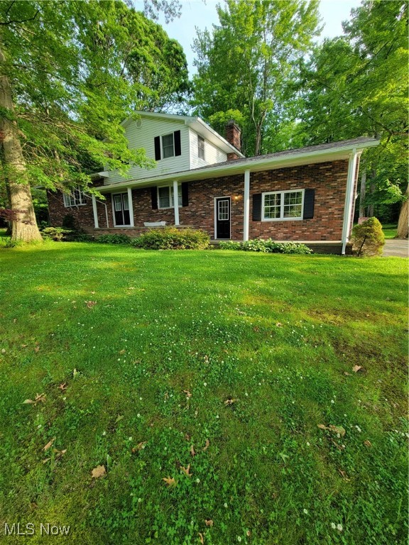 This tri Level home is set deep into a Scenic setting  on Donna Drive at Herman Street.  This well built home is nestled into this half acre semi wooded lot.  This home was designed and lived in by the current owner since 1970. Taking a visual tour by entering the double front door off a 4'x50' concrete porch to the 7'x14' Foyer and Bedroom 1/office. Four bedroom with this option.  From here go left up stairs to a 14'x24' Living Room featuring a large front window and then into the 11'x12' Dining room and then go full circle into the 11'x14' Eat in Kitchen featuring a large Bay window  for viewing the semi wooded back yard while doing breakfast. Then down steps to a half bath and the Family room featuring a 6' sliding door to the 10'8" x 22' Deck and back inside to  a brick veneer raised hearth fireplace.  From the Family room is the door and stairs to the 2 car garage. Then back to the Foyer to the lower level  accessed off of the Foyer.  Then up a set of steps where you will love this 23'4" x 27' rec room including your own pool table and misc furniture.  Then from here go down one more set of steps to a "Basement" Utility room and workshop only 20'3" x 27'7" which also houses the Electric box, Hot Water boiler, HW tank, Washer and Dryer,  Utility sink, misc appliances which may be removed by the Sellers.And now the final tour of the bedroom area of this home which steps up out of the end of the living room to 3 bedrooms. The Main Full bath,  Master bedroom 11'5"x13'4",  Master bath 5'8"x7', bedroom 2 -9'3"x10', and bedroom 3-  8'3x10'3". That should be  all there is but come see for yourself.