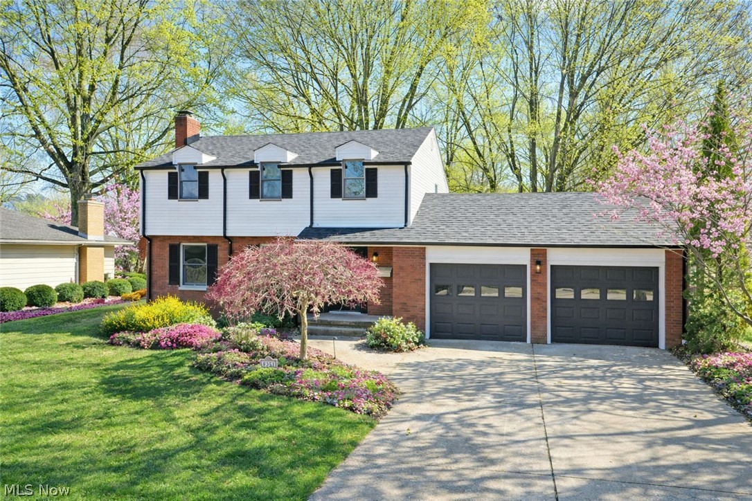 The wait is over! Experience two floors of style and comfort in this freshly renovated Poland home. From the moment you arrive, this property makes an impression with its crisp white siding, dark shutters, matching garage doors, and inviting curb appeal in a quiet neighborhood just minutes from local attractions. Out back, enjoy a beautifully designed outdoor space featuring a brick patio, stone-lined water feature, and a remodeled three-season room that has been insulated, painted, and carpeted for extended enjoyment. Inside, the foyer welcomes you with a carpeted staircase and opens to a stunning main living area. The living room features a striking fireplace accent wall, while hardwood-style flooring flows throughout the open layout. The beautifully updated kitchen is centered around a large island with faux-stone countertops and includes a hidden wine chiller, tiled backsplash, dual-basin sink, and stainless steel appliances. A bright dining area and convenient half bath complete the main floor. The entire home has been thoughtfully updated, including a refreshed living room and dining area that feel clean, modern, and move-in ready. Upstairs, you’ll find three spacious bedrooms, a beautifully updated full bath, and an oversized master suite with its own private bath featuring dual vanities and a gorgeous marble-style tiled shower. Major updates include roof and siding in 2025, a full bath added to the master suite, a kitchen remodel completed in January 2026, and a remodeled three-season room with added insulation, fresh paint, and new carpet. Call today for your private showing.