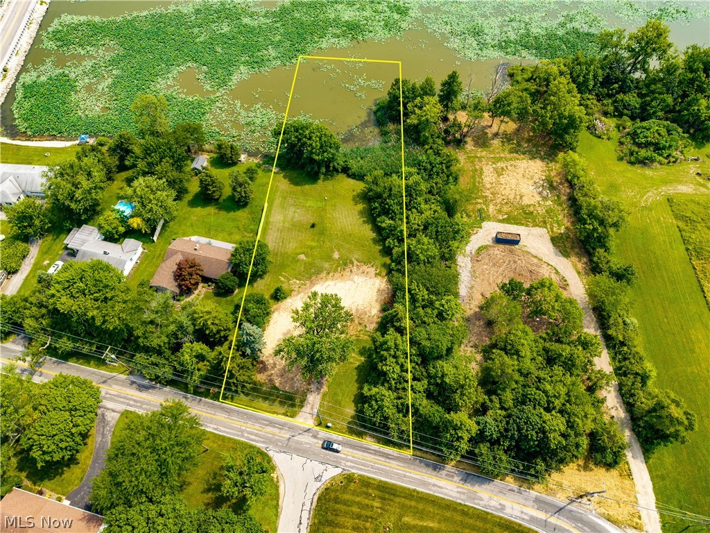 Build your dream home on this exceptional 2.49-acre waterfront home-site on desirable Catawba Island! Offering picturesque harbor views and a spacious open setting, this rare property combines the beauty of waterfront living with the convenience of being ready for your next chapter. A previous home has been removed, and public water, sewer, natural gas, and electric are already available at the site, helping simplify the building process and reduce development costs. While the harbor is not navigable, it provides a peaceful waterfront backdrop and scenic views to enjoy throughout the seasons. Just a short stroll from the acclaimed Gideon Owen Wine Company and only minutes from Miller Ferry, marinas, restaurants, shopping, and the many attractions of Catawba Island, this is an outstanding opportunity to build in one of Lake Erie's most sought-after communities.