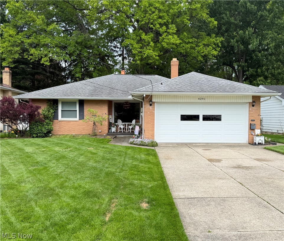 Welcome Home to this beautifully maintained brick ranch in North Olmsted.  You will notice the long driveway and beautiful landscaping as you make your way to the quaint front porch.  Once inside you will notice the large living room/dining room area. The dining side features a gas fireplace and a large window with great views of the serene backyard. Step into the large eat-in kitchen where there are plenty of cabinets for storage and all the appliances stay.  Off the kitchen is a generous sized laundry area with a utility sink. The heated garage provides ample storage space or a spot to park vehicles. This home features a large heated 20' x 10' sunroom with tranquil views of the peaceful backyard, or you may want to step into the rear yard to discover a full chain link fence, a brand new patio with Unilock pavers that is also heated and the storage shed.  Back inside there are two large bedrooms, one with a half bath and the other with his and hers closets.  The main bathroom is generously sized and has a shower/tub combo.  Updates to the house include a new hot water heater (2022) and a new baffle to the boiler, a new shed (2020), the beautiful heated patio (2024), all ceilings were painted in 2025 and the roof is just over 10 years old.  Schedule your showing today!