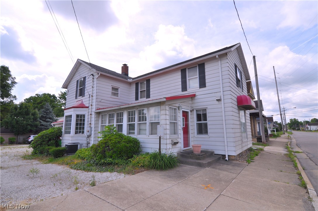 This is the opportunity you have been waiting for! Welcome to 25 31st St on one of the hottest corners in town! This home/business has loads of potential! Zoned both Residential and Commercial, the choice is yours! This onetime thriving beauty salon boasts over 2007sf of potential space. Downstairs you will find a cozy kitchen/mudroom area that leads to an amazing dining/office area. Loads of windows and space for you to design to your liking! Your Great room has a gorgeous fireplace and tons of natural light! This would make an amazing family room/ Main working area. Your Full Bath and bonus room finish off the 1st floor. Upstairs your will find 4 large bedrooms and tons of storage space. Outside your parking lot has plenty of space for clients or to finish into a gorgeous private backyard of your dreams!! Schedule your showing today! This property will not last!!