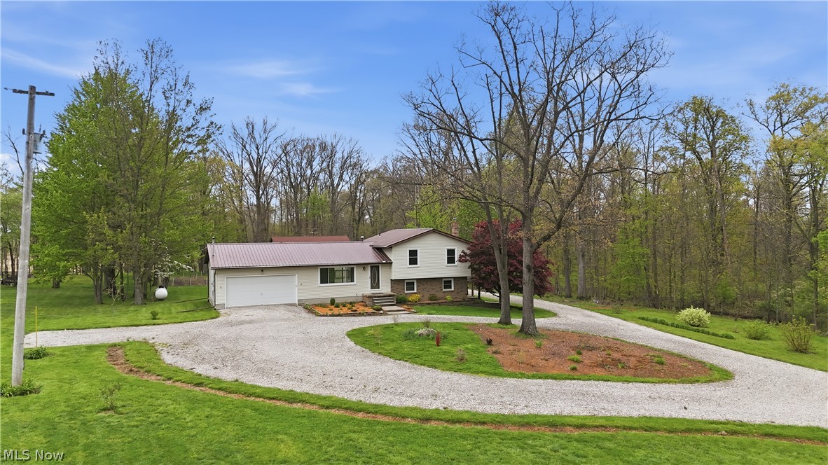 Spacious Split-Level on Nearly 3 Acres with Dream Workshop in Crestview Schools

Looking for space, flexibility, and room to actually live? This multi-level split at 203 Timmerman Rd delivers four levels of living, giving you the freedom to spread out without losing connection.

Set back off the road with an approximately 1-acre front yard, this property offers a level of privacy and separation that is hard to find. The 15-foot-wide driveway is a standout feature, ideal for larger trucks, trailers, or anyone who needs extra room to maneuver without the daily hassle.

Inside, you will find 3 bedrooms with the potential for a 4th bedroom, home office, or flex space, along with 2.5 bathrooms. Multiple living areas mean no more trying to force one space to do it all, there is room here for everyone.

Step outside and the value keeps stacking. Situated on 2.98 acres, the property includes a 2-car attached garage, an impressive 30x40 insulated and heated workshop, and an 8x10 storage shed. Whether you run a business, love projects, or just want space to spread out, this setup delivers.

All of this while being conveniently located near local attractions like the Ohio State Reformatory, Kingwood Center Gardens, and the Ohio Bird Sanctuary.

If you have been waiting for a property that offers space, function, and flexibility, this one checks boxes most homes cannot.

Please allow 48 hours for response to any offers.