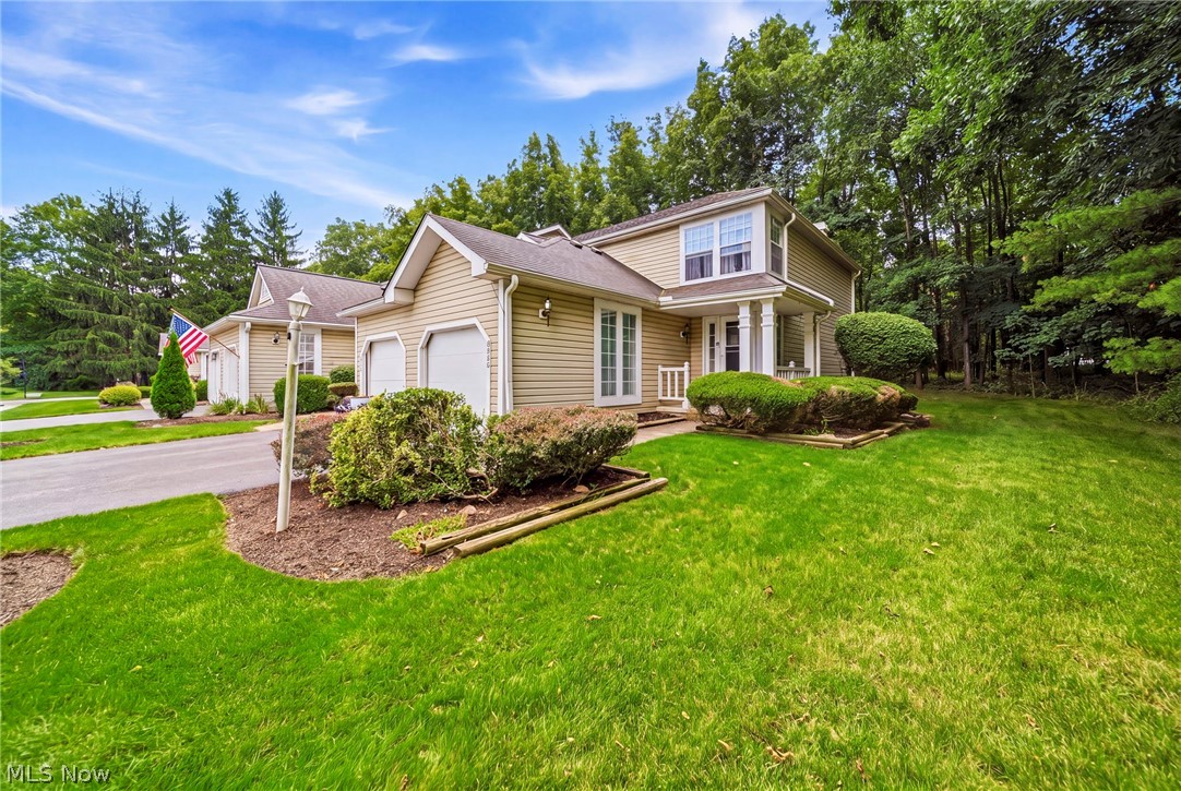 Awesome end unit corner condo with woods. Living room with fireplace and patio door leading to private patio. Upstairs you will find two generous sized bedrooms and a full bath.  Basement is partially finished with a full bath and an additional room for your needs.  All appliances stay.