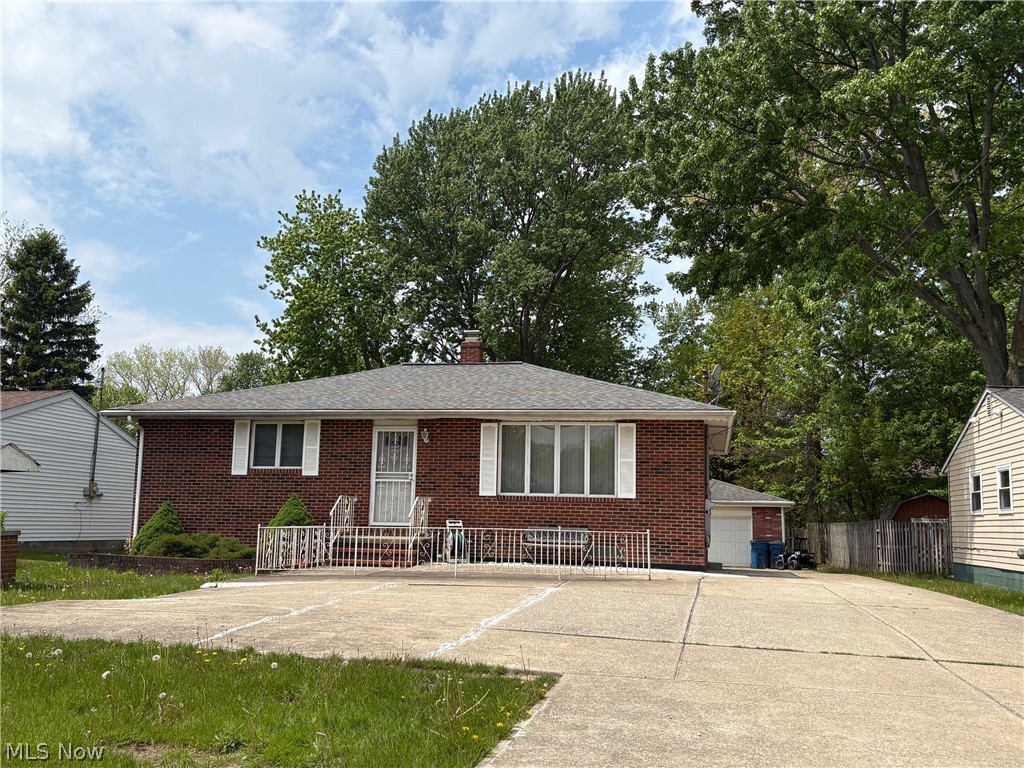 All brick ranch with 2 car garage and 2 full baths. Spacious rooms throughout. Large eat in kitchen with ceramic tile floors, new stainless steel dishwasher, gas stove and plenty of cabinet and counter space flows to dining room. Spacious living room with carpeting and ceiling fan. Addition with bay window could be a family room, thrid bedroom or office area. Two nicely sized bedrooms with carpet. Full bath on main level with ceramic floors and tub surround. Walk up attic is great for storage. Huge full finished basement has loads of potential--finished side features kitchenette, carpeted rec area, laundry room, second full bath with shower and an office space. Glass block windows. 2.5 car detached garage. Anderson windows throughout. HVAC 2016. Basement partially waterproofed on exterior and new sewer line installed 2025/2026. Great investment opportunity or starter home!