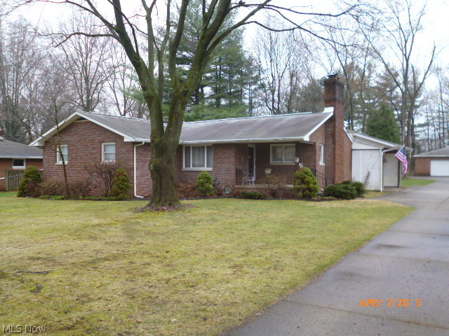 Beautiful brick ranch in the Lake Cable area sets on ¾ acre lot with large trees and plenty of outdoor space to enjoy warmer weather.  The interior offers some newer carpeting, wood floors in kitchen, dining and hallway.  The split bedroom floor plan
And finished recreation room are also very desirable.  A second kitchen and amazing amount of storage space also in the basement. 
Convenient to the airport, expressway, shopping and other services. Total sq footage includes the rec room and the enclosed back porch.